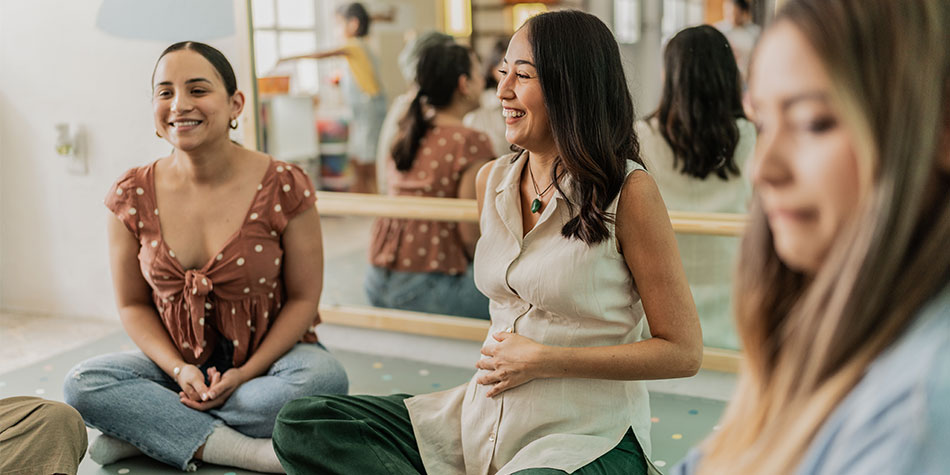 Expectant moms attend a childbirth education class